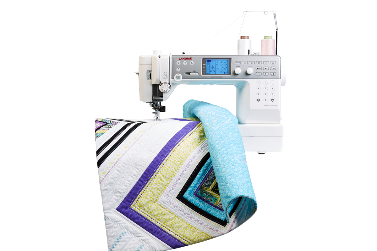 Janome MC6700 Professional Longer Arm Space Sewing Machine all metal flatbed machine 200 stitches ***Special Purchase - Save £230***