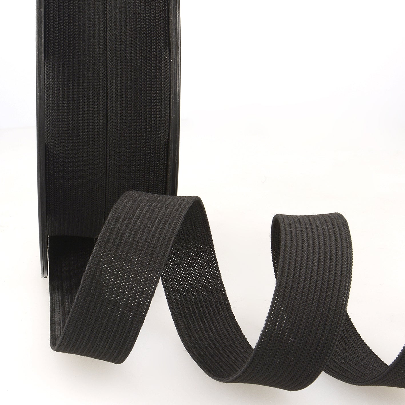 Black elastic on the roll 25mm wide - sold by the meter