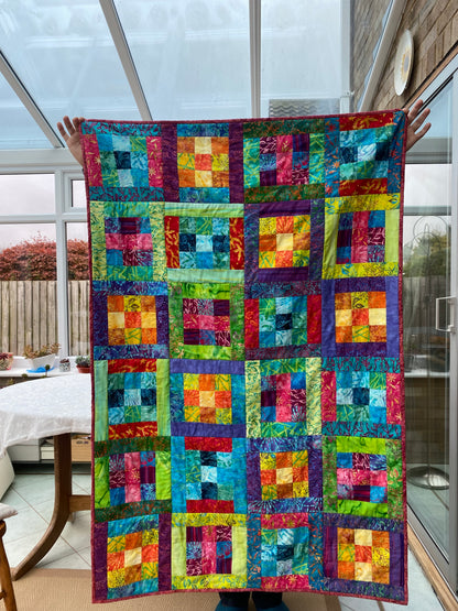 Beginner Quilt - Bordered Nine Patch Jelly Roll Quilt