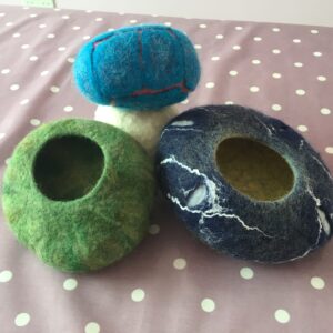 completed wet felted bowls