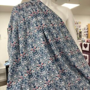 Top Quality Cotton Poplin printed with beautiful arts and crafts style birds design with red and blue colours dominating.  Suitable for many dressmaking projects such as pyjamas, shirts, dresses, skirts - sold per meter 