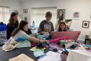 teens enjoying the sewing studio