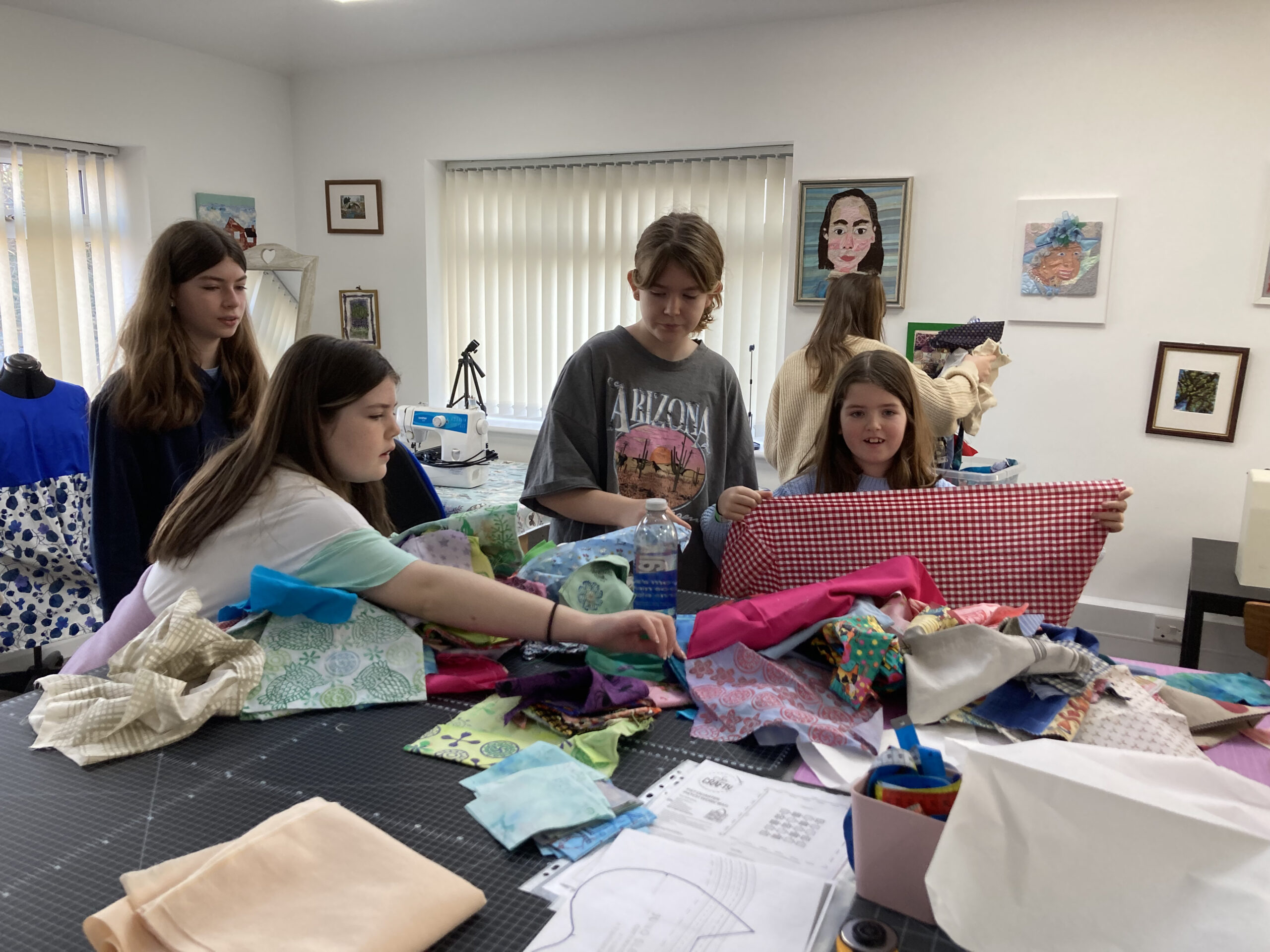teens enjoying the sewing studio